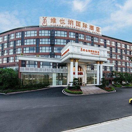 Vienna International Hotel Luogang Wanda Plaza Гуанчжоу Экстерьер фото